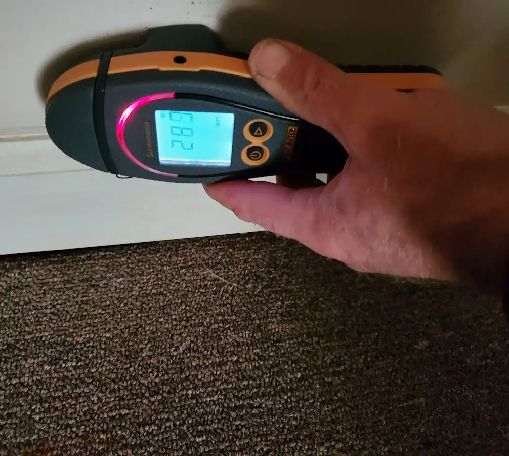Moisture detection at baseboard during Storm Damage Restoration in San Jose